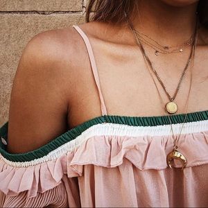 Storets top with pleated sleeves